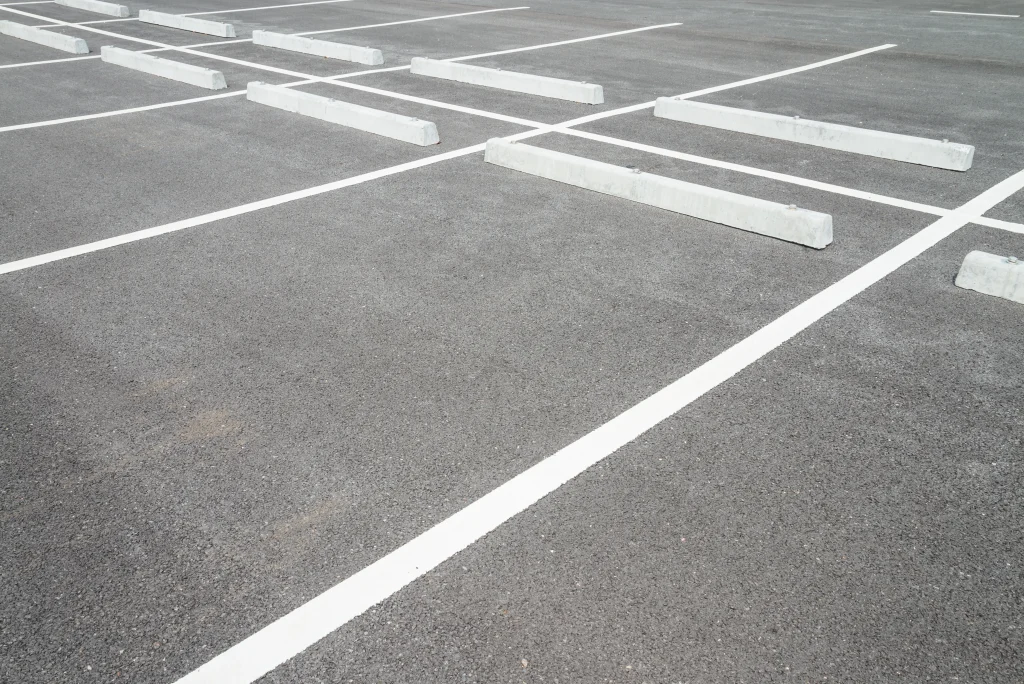 Freshly painted concrete parking lot lines