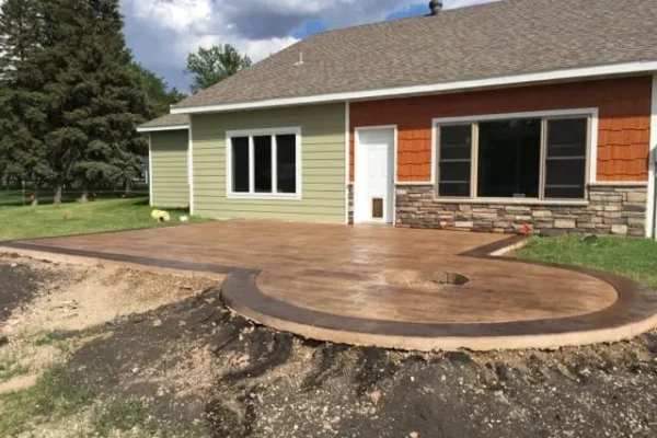Stamped concrete patio at residential home – Concrete Construction