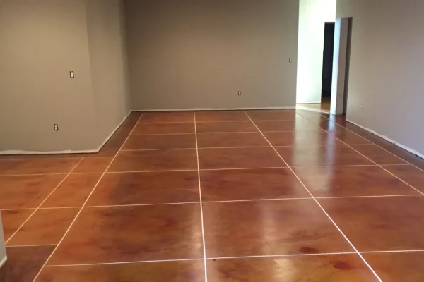 Decorative stained concrete floor inside basement